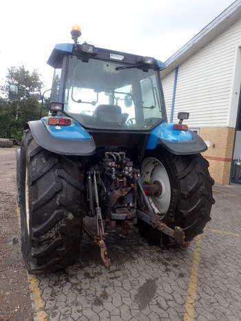 salg af New Holland 7840 traktor