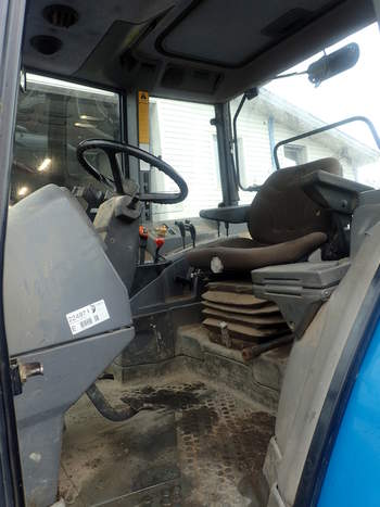 salg af New Holland 7840 traktor