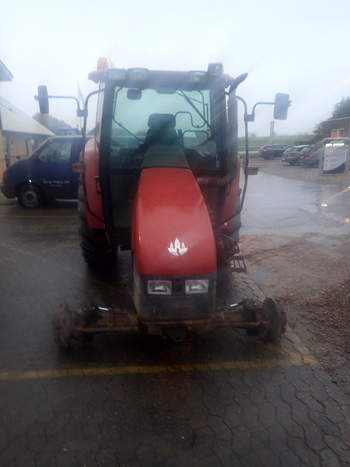 salg af New Holland TL90 traktor