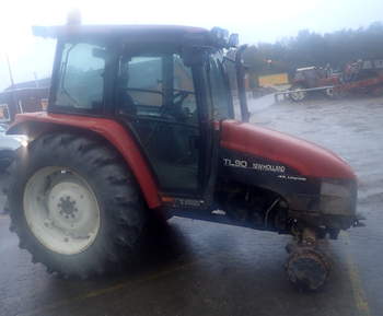 salg af New Holland TL90 traktor