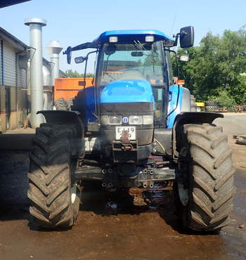 salg af New Holland TM155 traktor