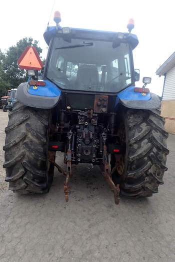 salg af New Holland TM155 traktor