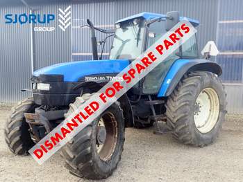 salg af New Holland TM135 traktor