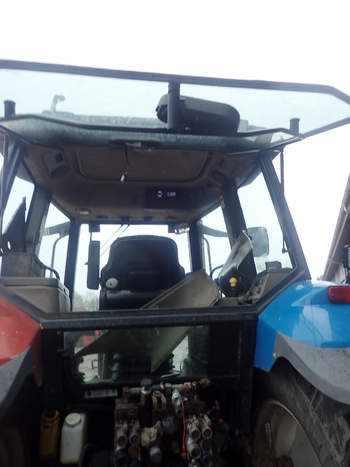 salg af New Holland M115 traktor