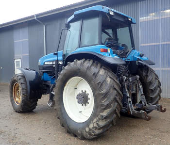 salg af New Holland 8670 traktor