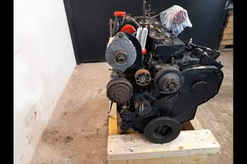 salg af Motor New Holland TG285