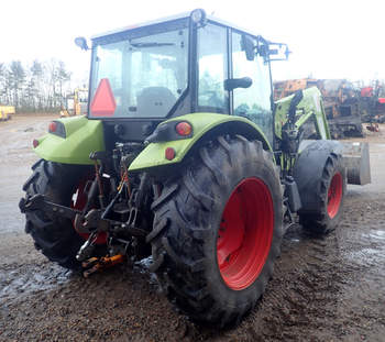 salg af Claas Axos 340 traktor