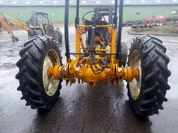 salg af Traktorgrävare Massey Ferguson 60 HX 