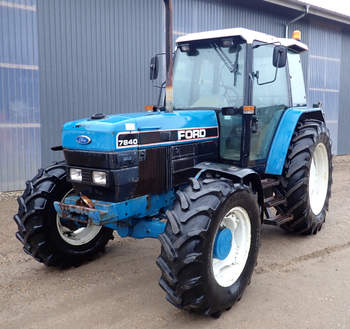salg af New Holland 7840 traktor
