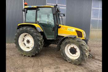 salg af New Holland TL100A traktor