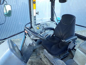 salg af New Holland 7840 traktor