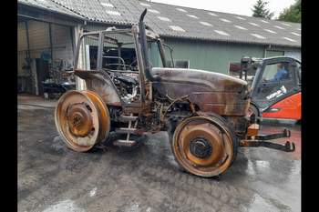 salg af New Holland M115 traktor