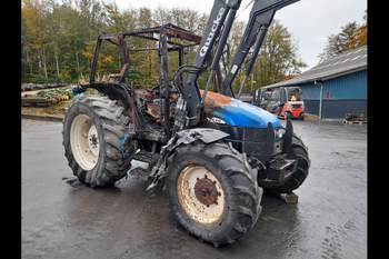 salg af New Holland TL100 tractor