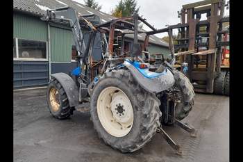 salg af New Holland TL100 traktor