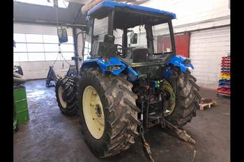 salg af New Holland TL100A traktor