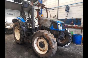 salg af New Holland TS100A traktor