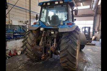 salg af New Holland 8670 traktor