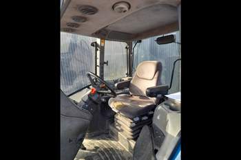 salg af New Holland TM165 traktor