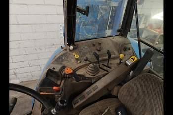 salg af New Holland M135 traktor