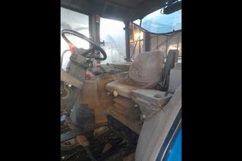 salg af New Holland M135 traktor