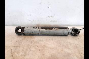 salg af New Holland M135  Front axle steering cylinder