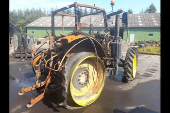 salg af John Deere 6215R traktor