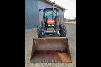 salg af New Holland L85 traktor