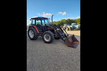 salg af New Holland L85 traktor