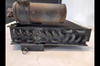 salg af New Holland TS115 Condenser