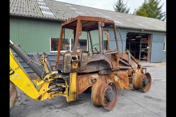 salg af New Holland B115C Backhoe
