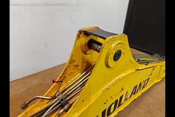 salg af New Holland B115C  Gravarm Bom