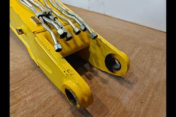 salg af New Holland B115C  Gravarm Bom