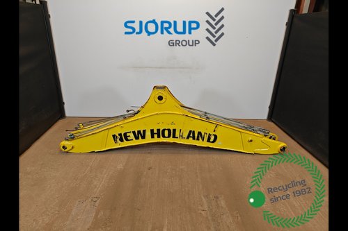 salg af New Holland B115C  Gravarm Bom