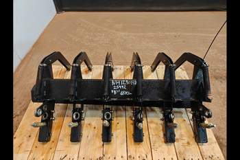 salg af Garnstrammer New Holland 1290