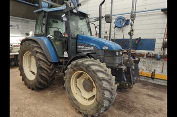 salg af New Holland TS100 traktor