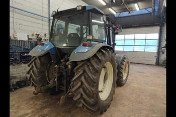 salg af New Holland TS100 traktor