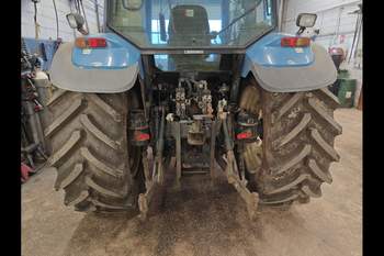 salg af New Holland TS100 traktor