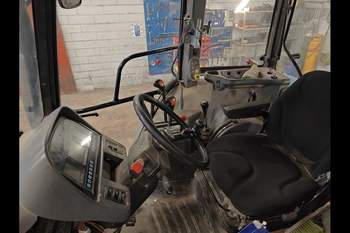 salg af New Holland TS100 traktor