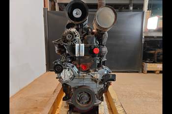 salg af Motor New Holland TS100