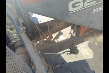 salg af New Holland G210 traktor