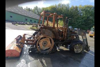 salg af New Holland TS110 traktor