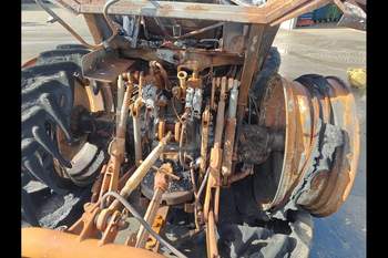 salg af New Holland TS110 traktor