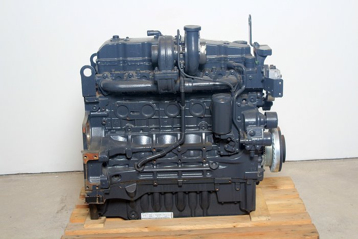 Двигатель new holland. Двигатель кейс Пума 210. Головка двигателя Case Puma 210. Двигатель Case 2366. Марка двигателя Case 2366.