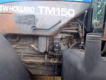 salg af New Holland TM150 traktor