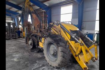 salg af zerlegte Baggerlader New Holland B115C