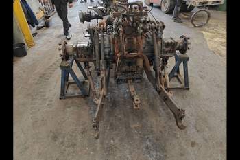 salg af New Holland TS115 traktor