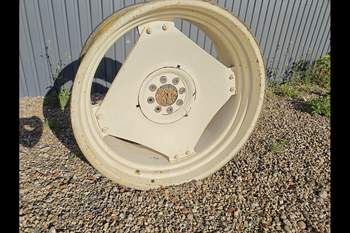 salg af Hinterfelge New Holland TS100 LINKS