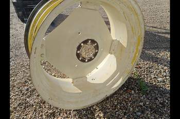 salg af Hinterfelge New Holland TS100 LINKS